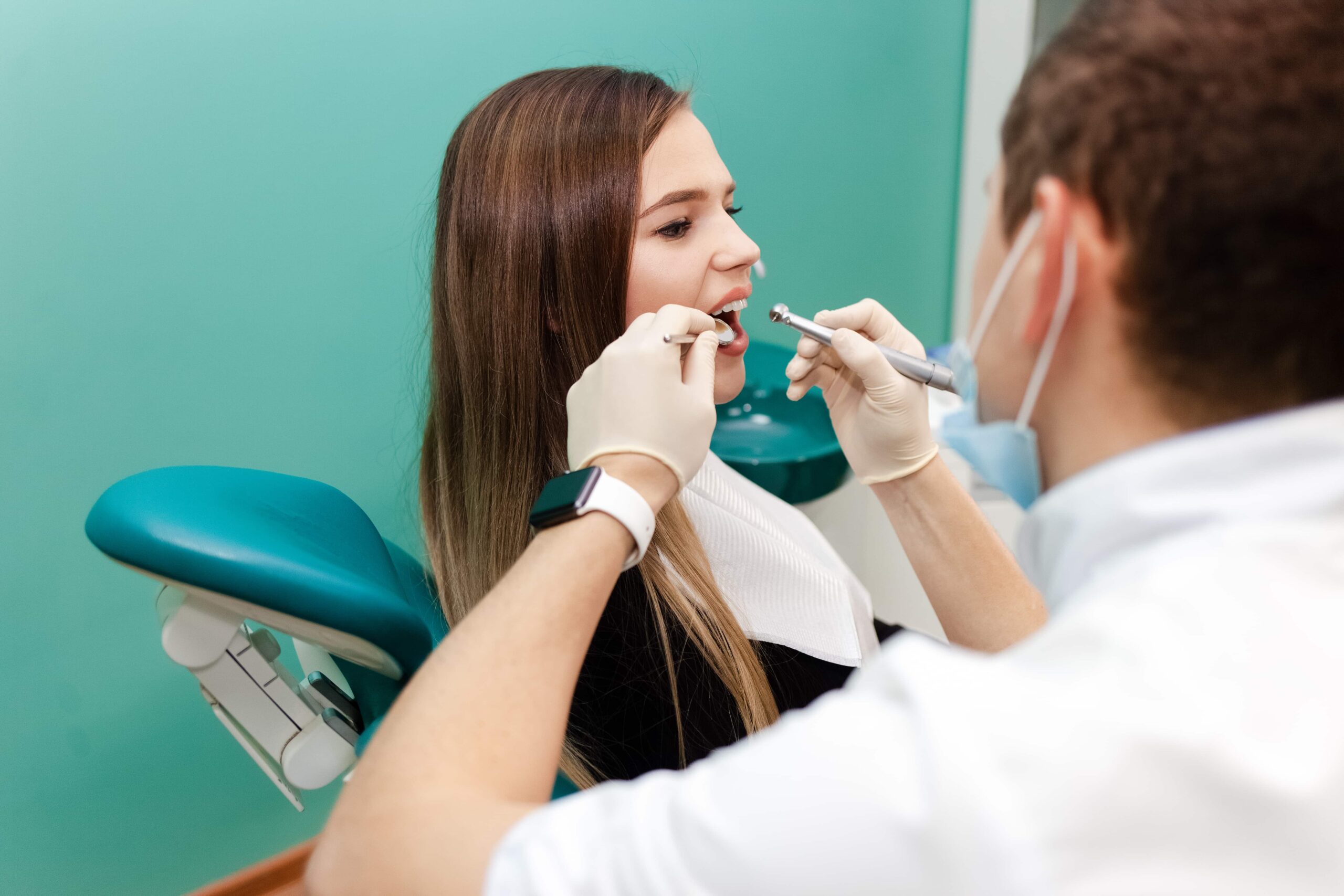 Periodontist discussing dental implant options