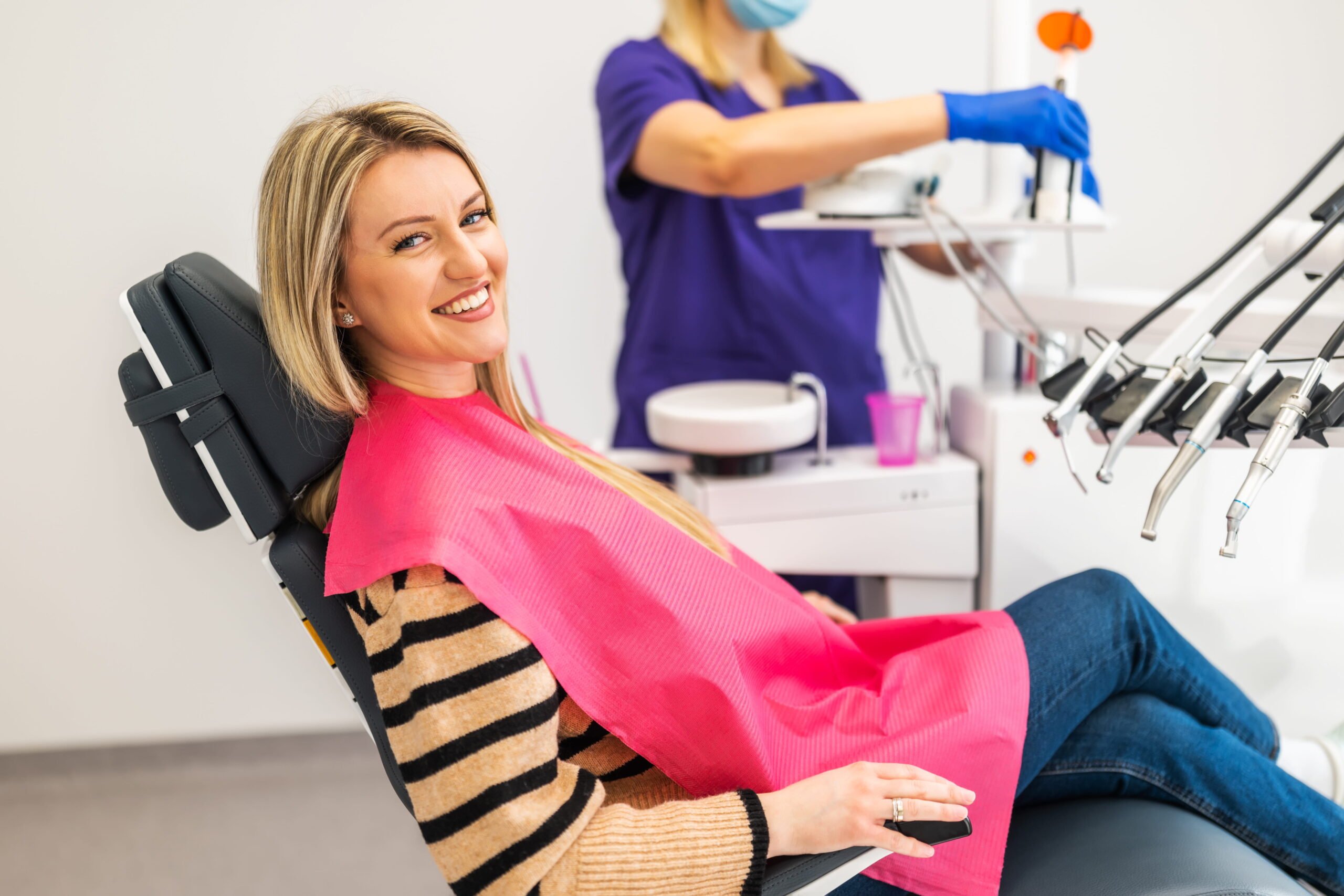 Portland periodontist reviewing dental implant options with patient who has gum disease